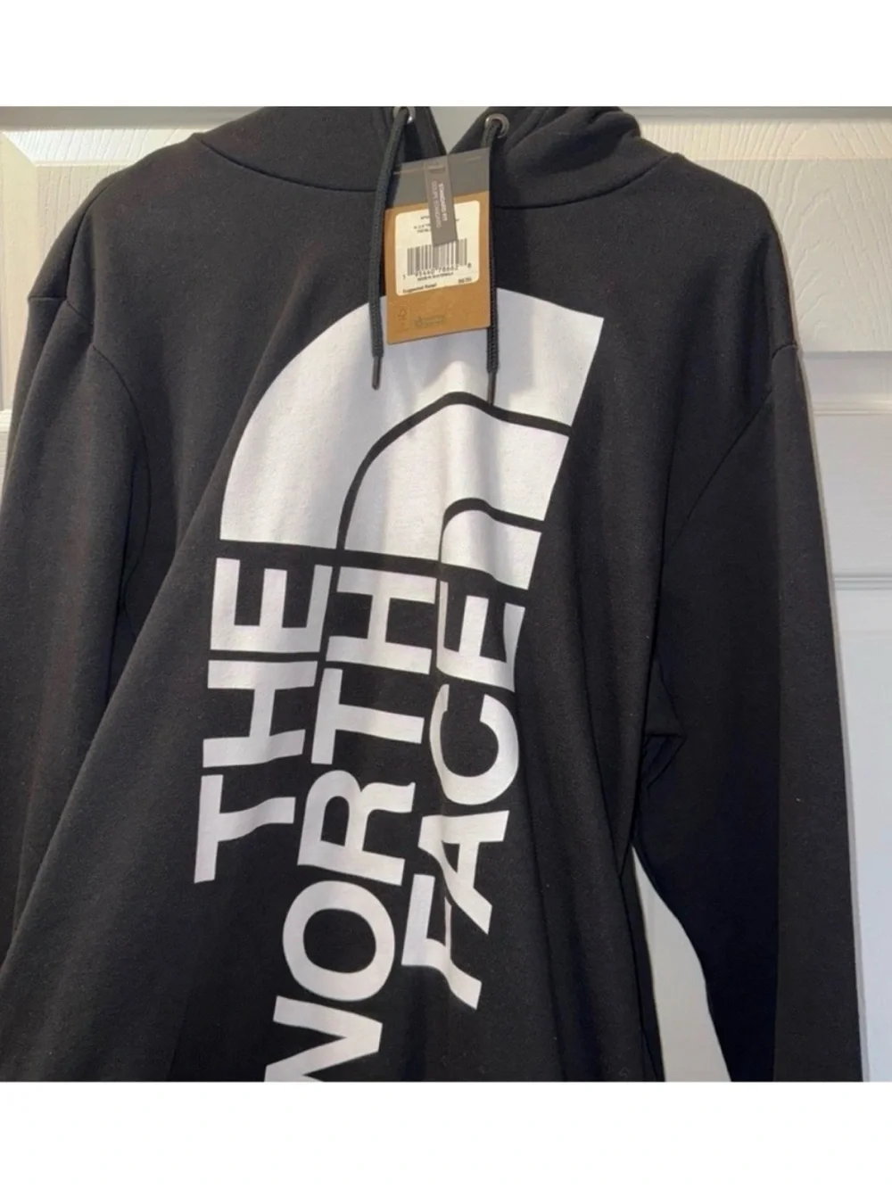 The North Face Men’s Black Hoodie with White Vertical Logo